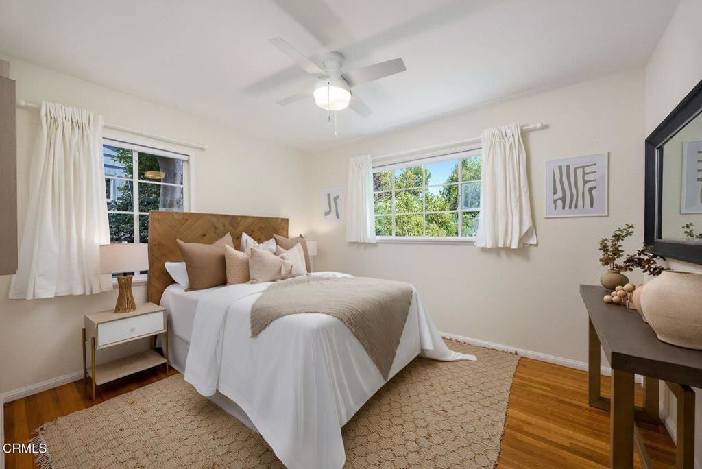 Light-filled bedroom with dual windows