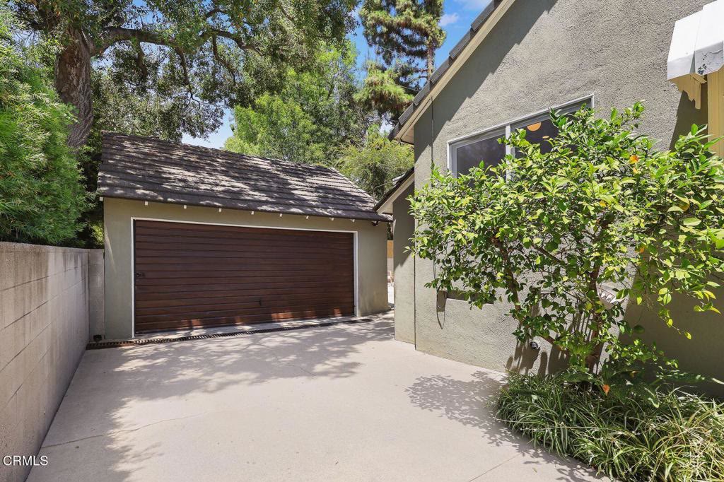 Detached two-car garage with driveway