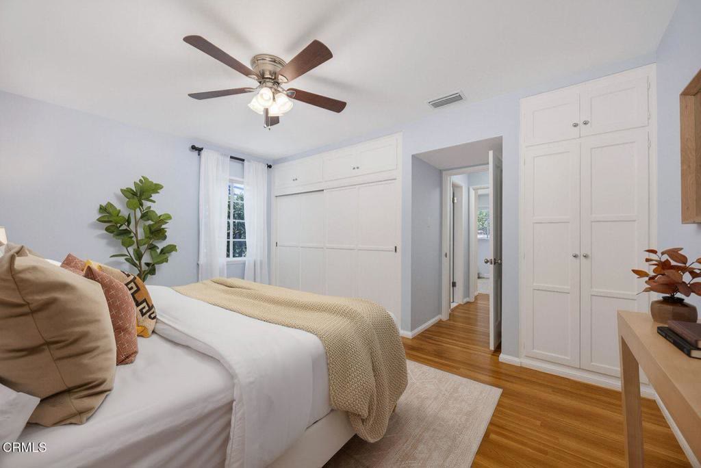 Bedroom with ceiling fan and garden outlook