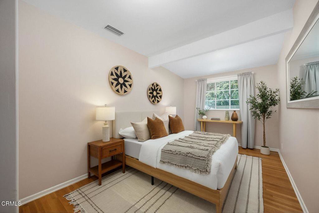 Fourth bedroom with warm natural light