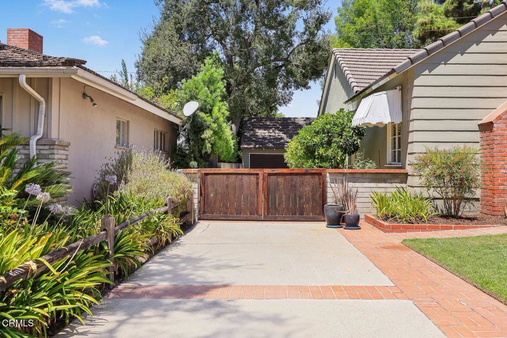 Side yard walkway with mature plantings
