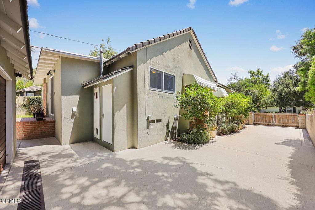 Garage side elevation and paved parking area