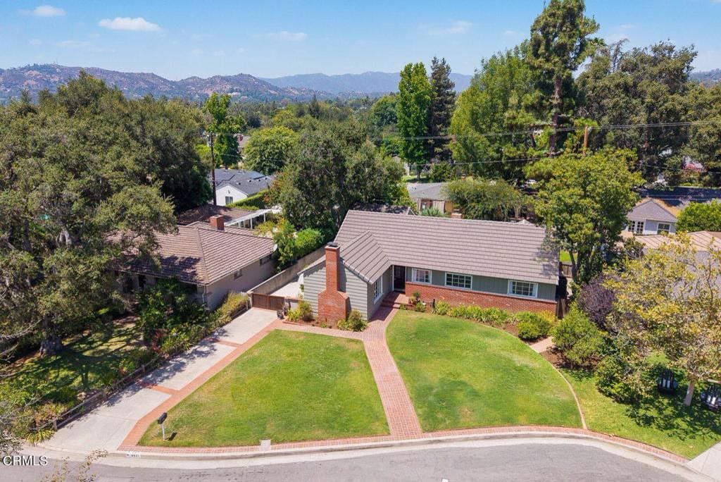 Aerial view of the home and its 8,123 square foot lot