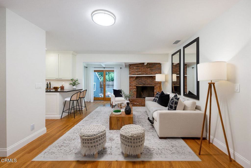 Family room with second fireplace and counter seating
