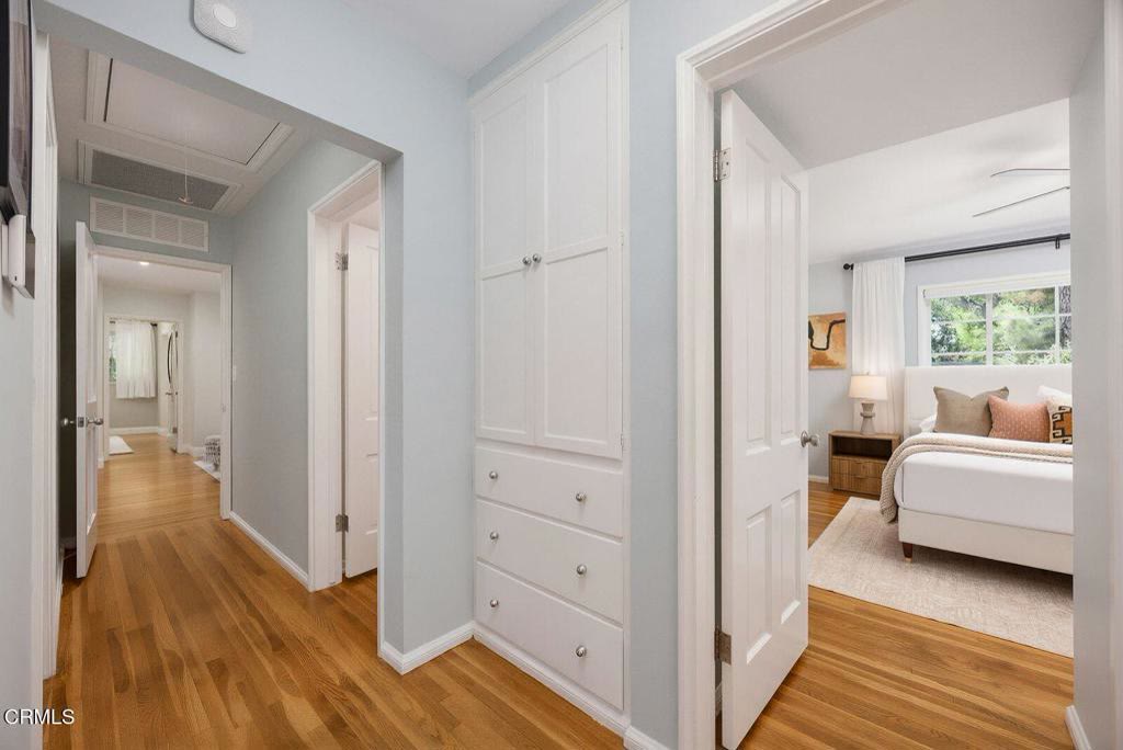 Hallway with built-in linen storage